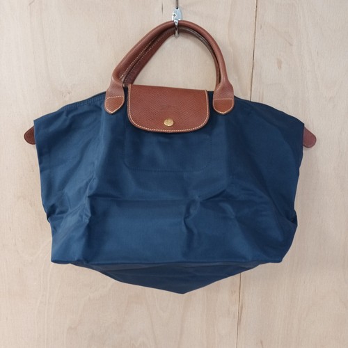 Longchamp pliage déposé - le,